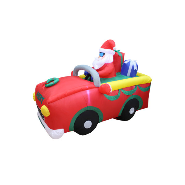The Holiday Aisle Santa Claus Riding on Red Car Christmas Inflatable